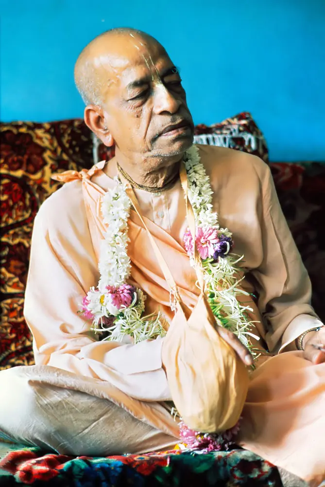 Prabhupada Meditatively Chanting Japa in his Room