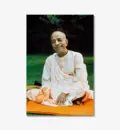 Prabhupada Smiling Sitting on Orange Blanket on Grass