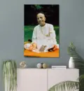 Prabhupada Smiling Sitting on Orange Blanket on Grass