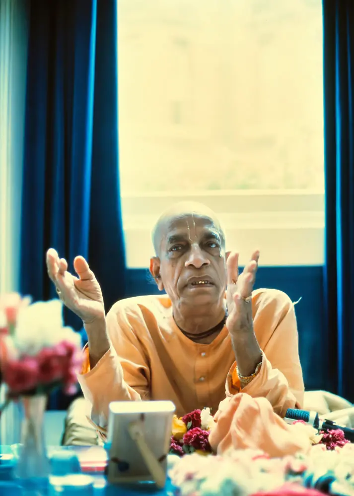 Prabhupada Sitting at His Desk Explaining the Krishna Philosophy