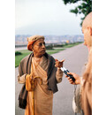 Srila Prabhupada Carrying a Cane on a Morning Walk