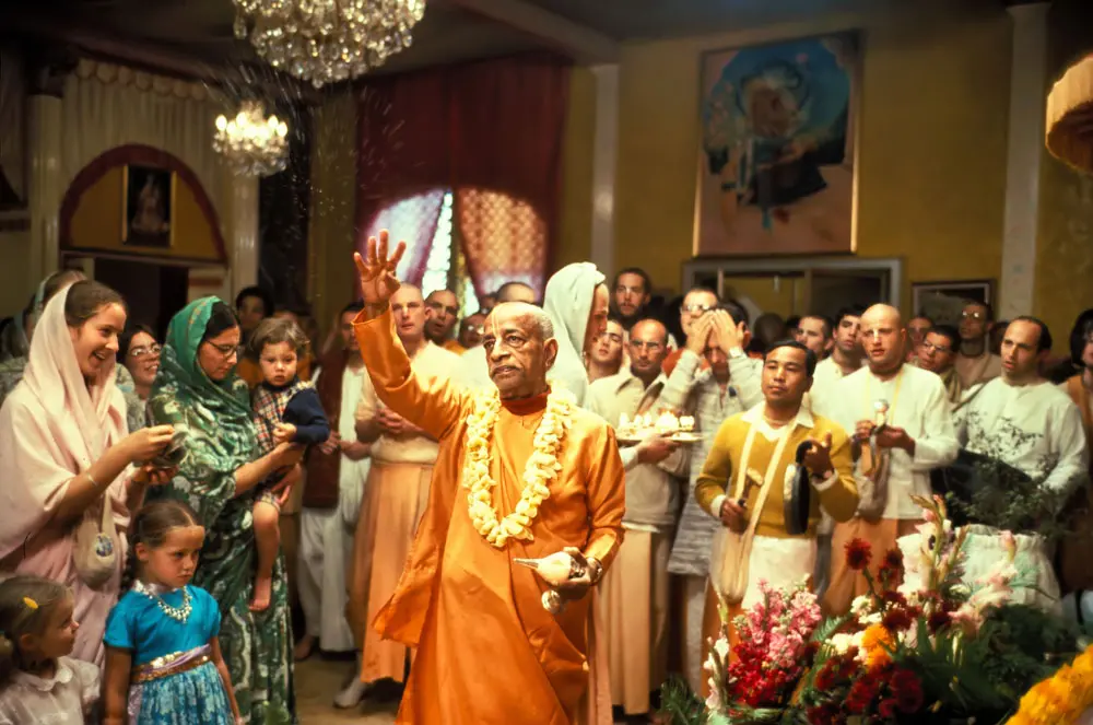 Srila Prabhupada Sprinkles Water from Conchshell